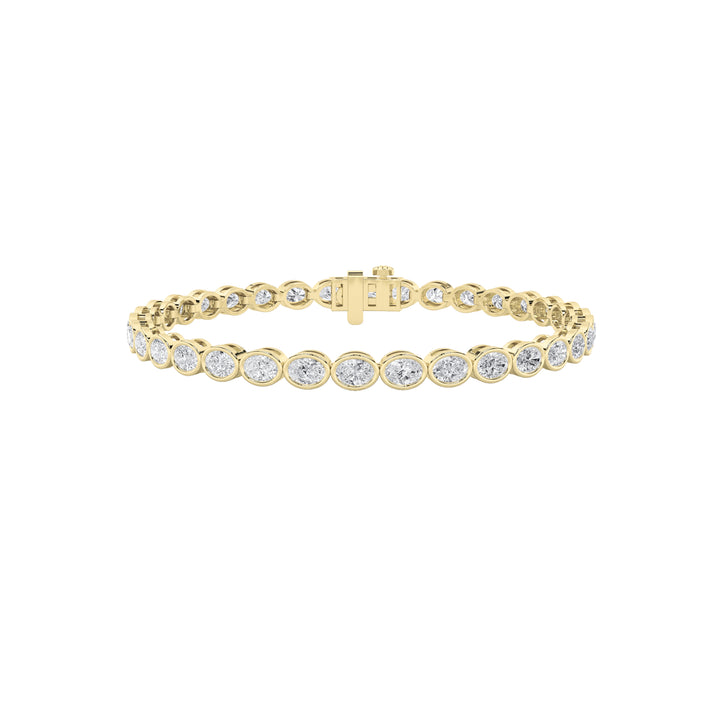 15CTW Oval Shaped Lab Grown Diamond (F/VS) East West Bezel Set Bracelet in 14K Gold